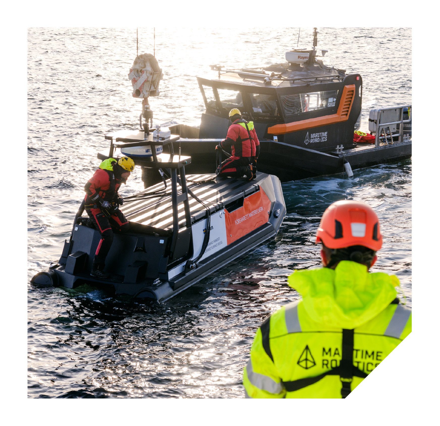 Our people working at sea with a Mariner and a vessel